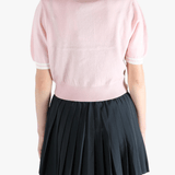 Pink top,worn by a person, showing the top fit