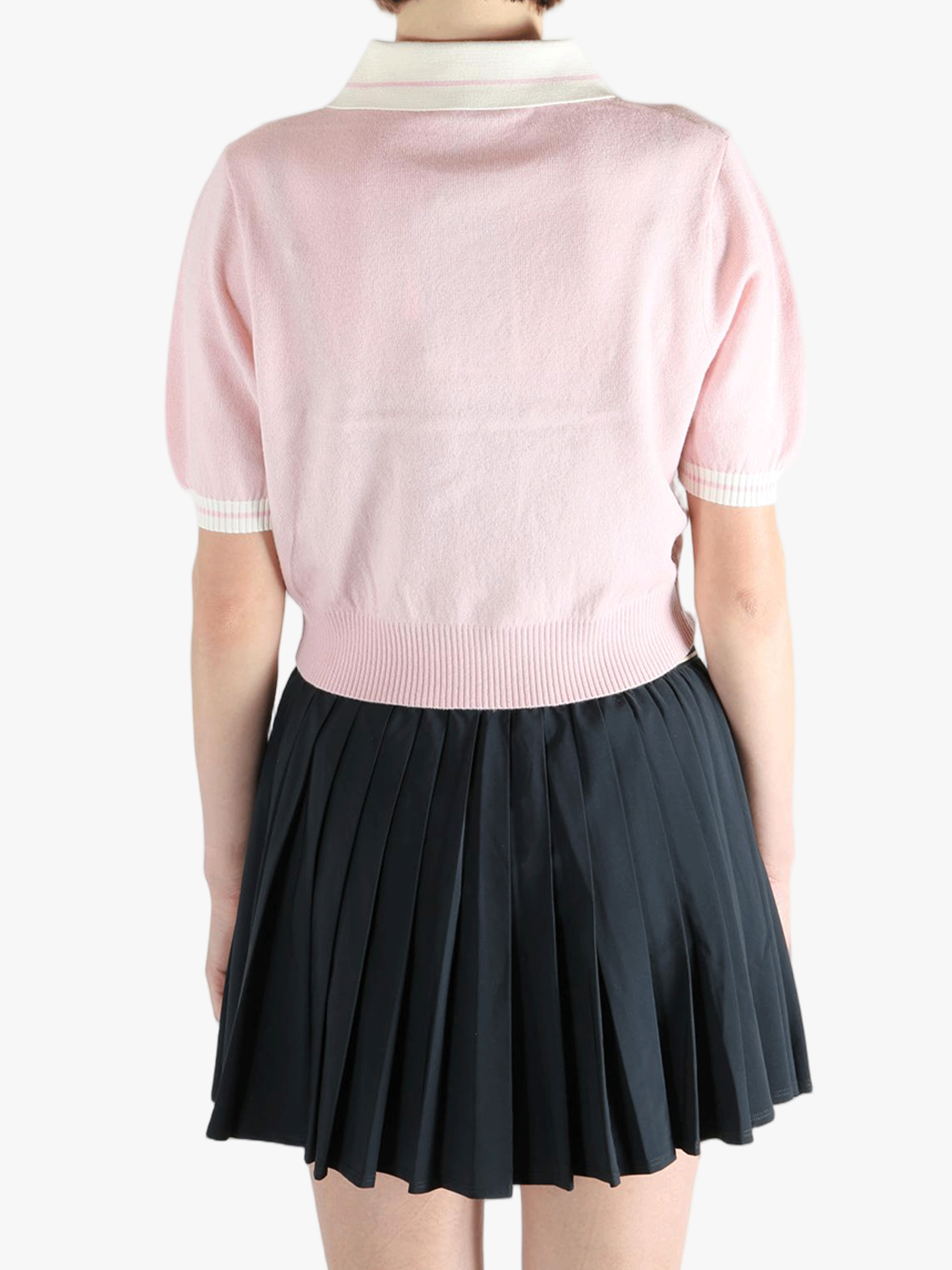 Pink top,worn by a person, showing the top fit