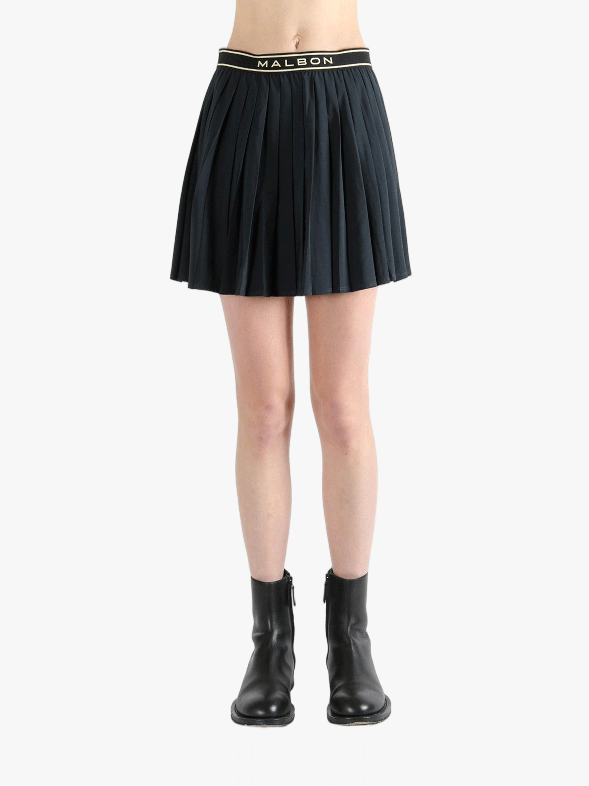 Black skirt,worn by a person, showing the skirt fit