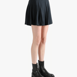 Black skirt,worn by a person, showing the skirt fit