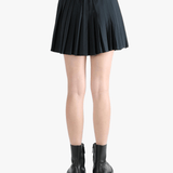 Black skirt,worn by a person, showing the skirt fit