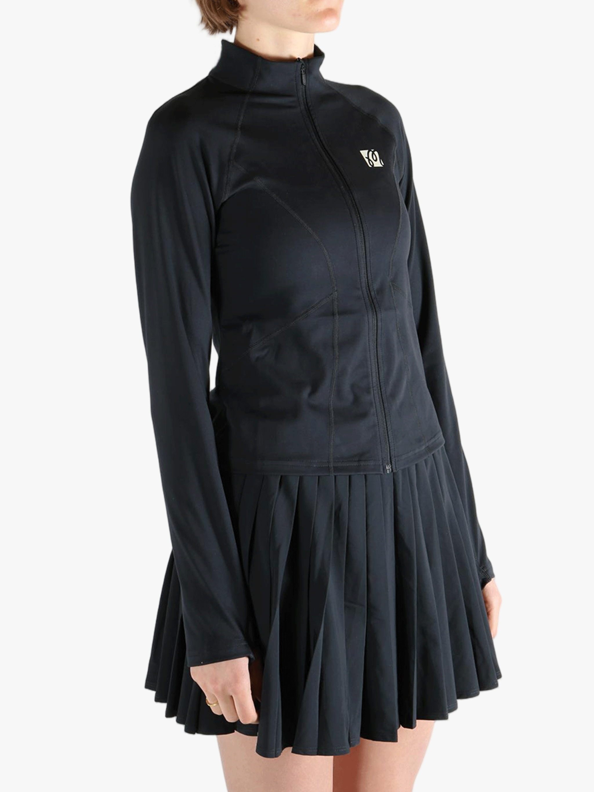 Black jacket worn by a person, showing the jacket fit