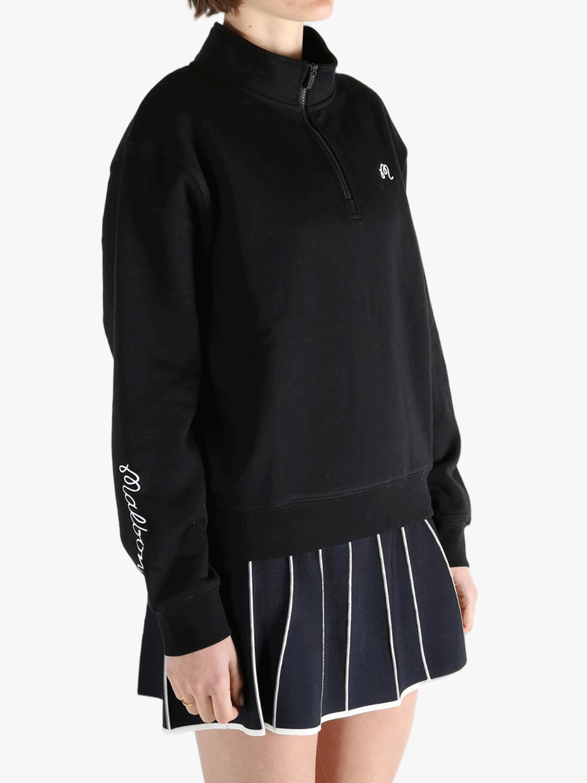 Black sweatshirt worn by a person, showing the  sweatshirtfit