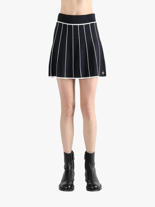 Blue skirt,worn by a person, showing the skirt fit