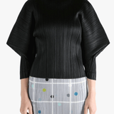 Black shirt,worn by a person, showing the shirt fit