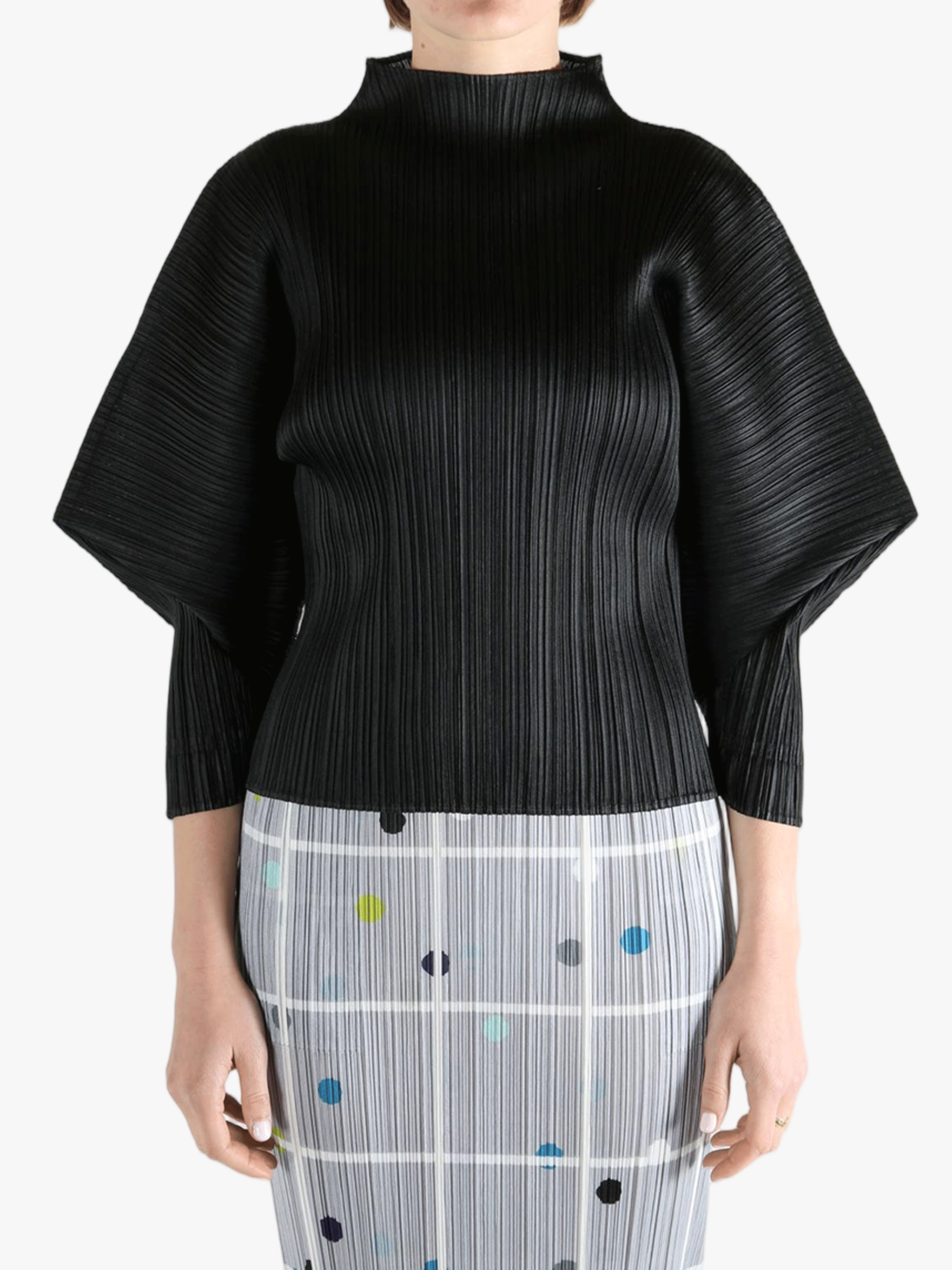 Black shirt,worn by a person, showing the shirt fit