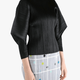 Black shirt,worn by a person, showing the shirt fit