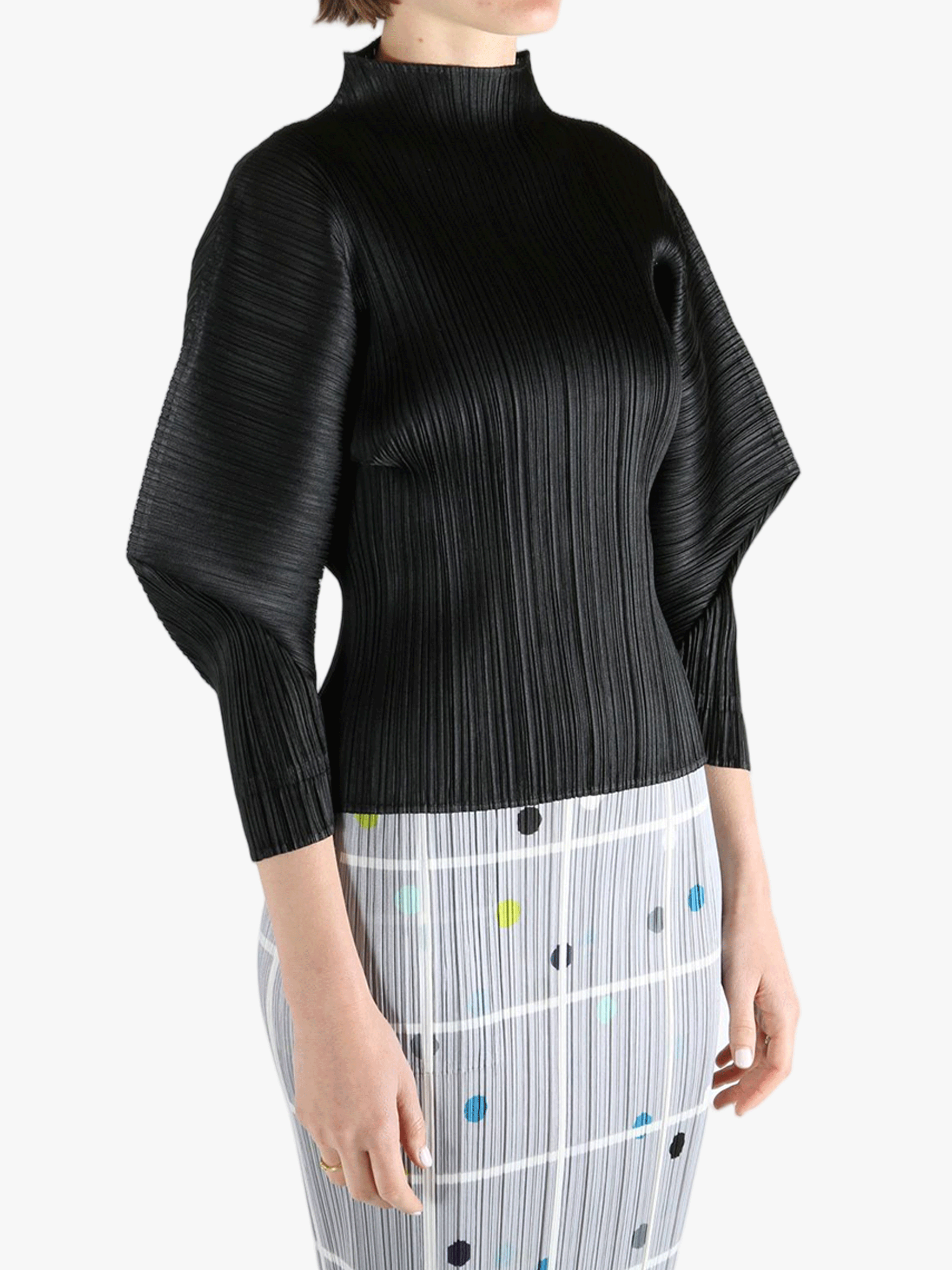 Black shirt,worn by a person, showing the shirt fit