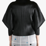 Black shirt,worn by a person, showing the shirt fit