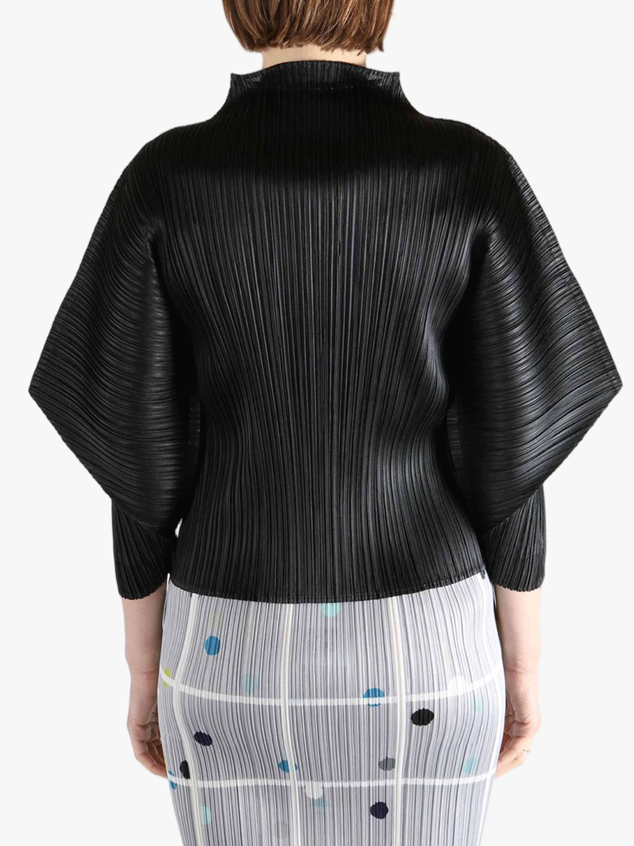 Black shirt,worn by a person, showing the shirt fit