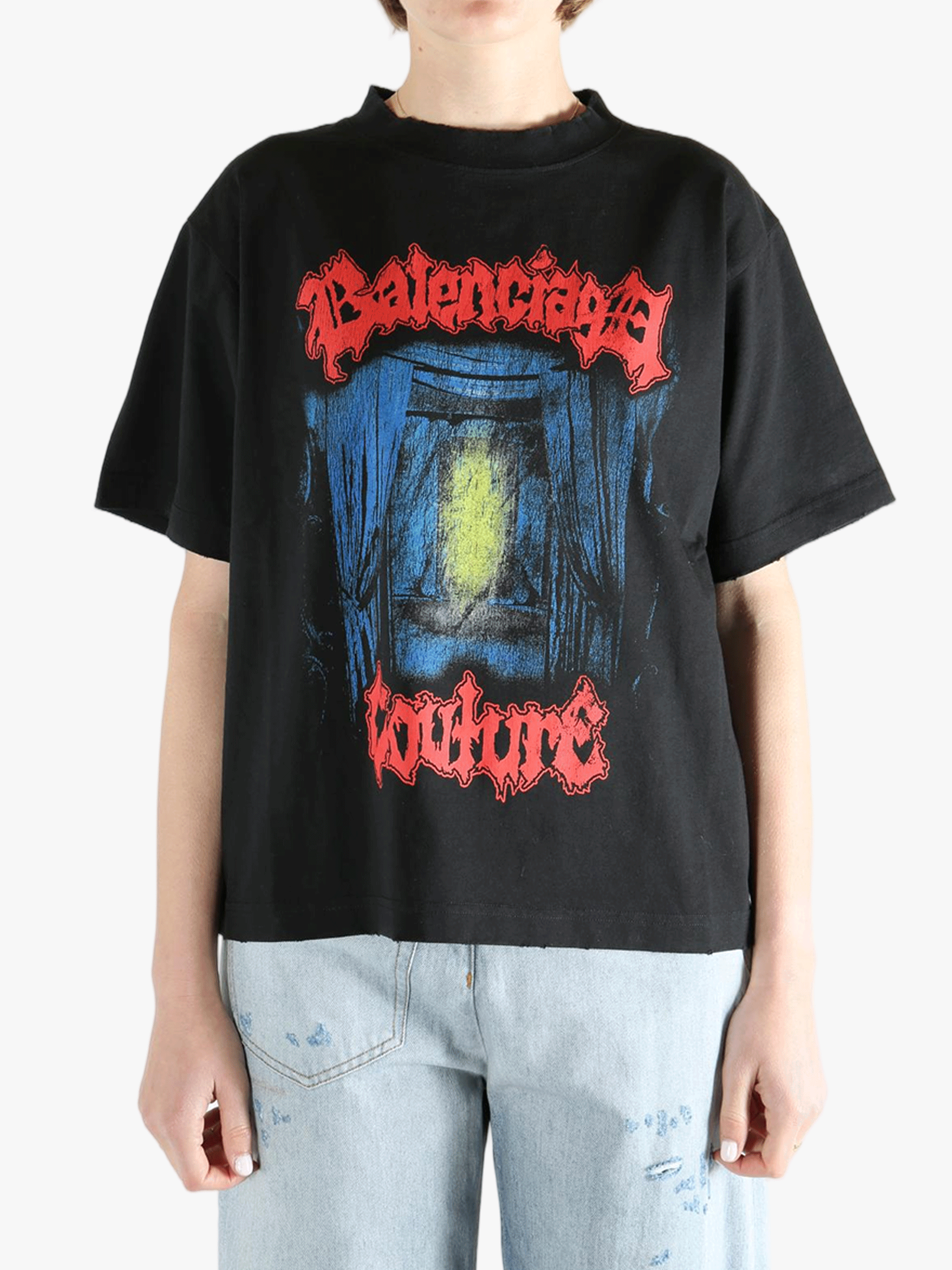 Black T-shirt worn by a person, showing the T-shirt fit