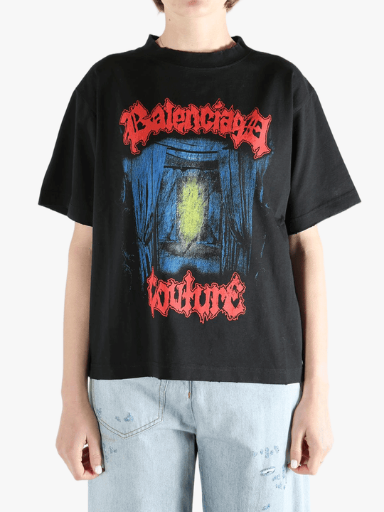 Black T-shirt worn by a person, showing the T-shirt fit