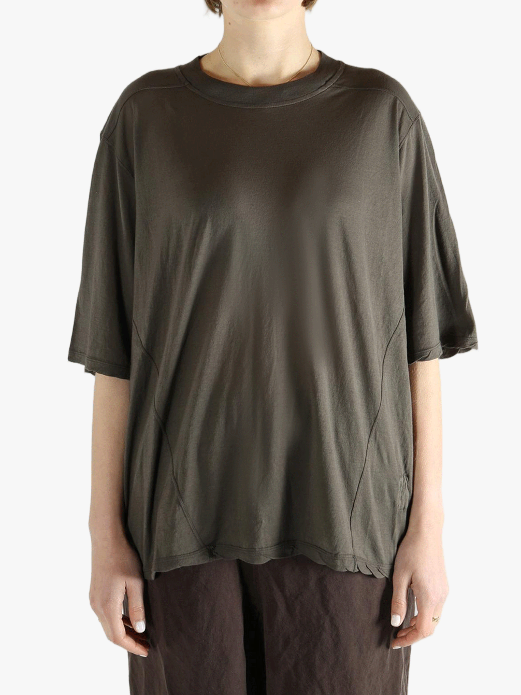 Grey T-shirt worn by a person, showing the T-shirt fit