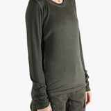 Grey tee  worn by a person, showing the tee fit