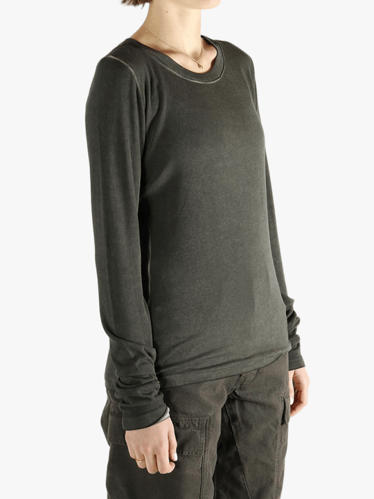 Grey tee  worn by a person, showing the tee fit