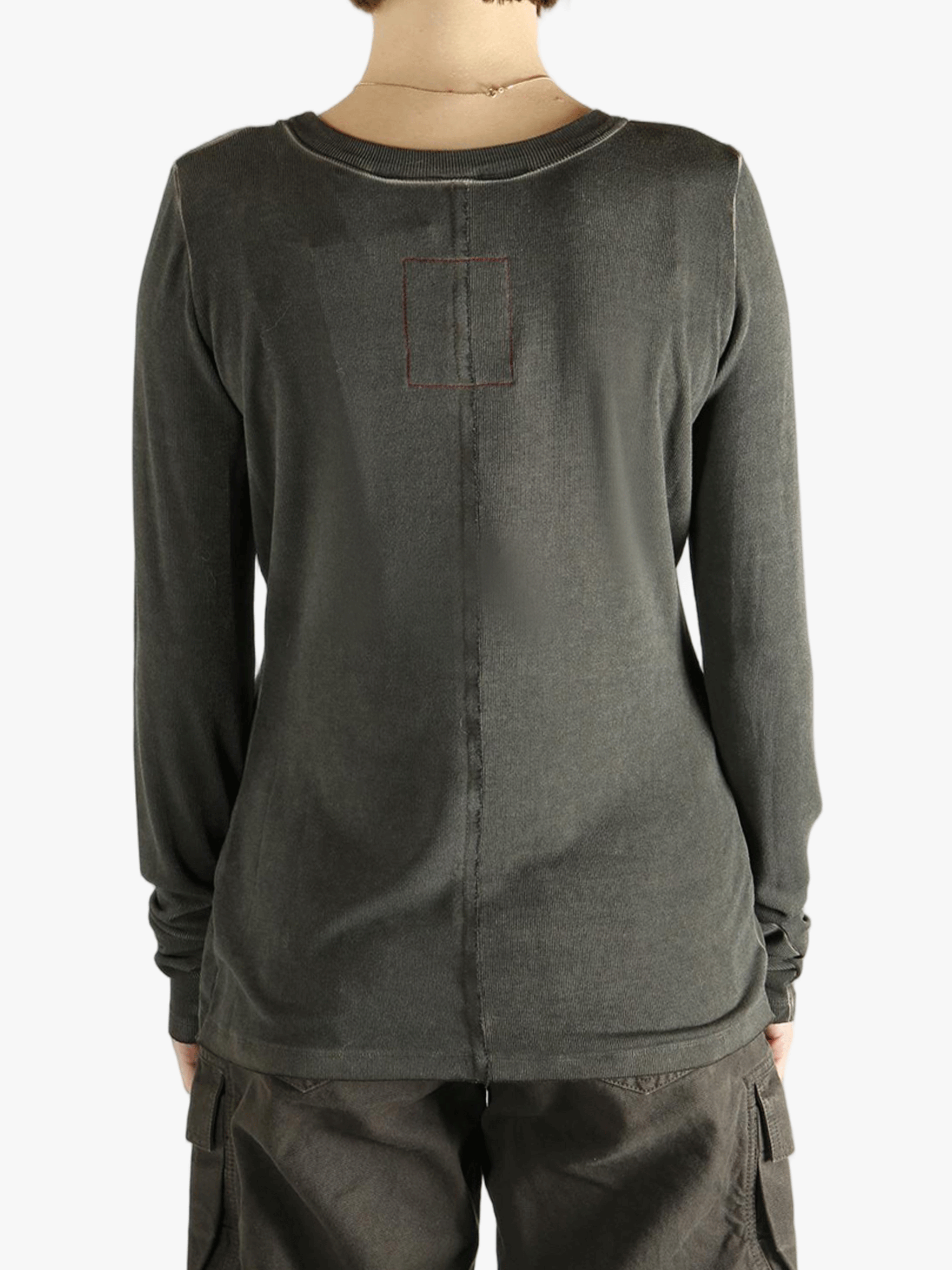 Grey tee  worn by a person, showing the tee fit