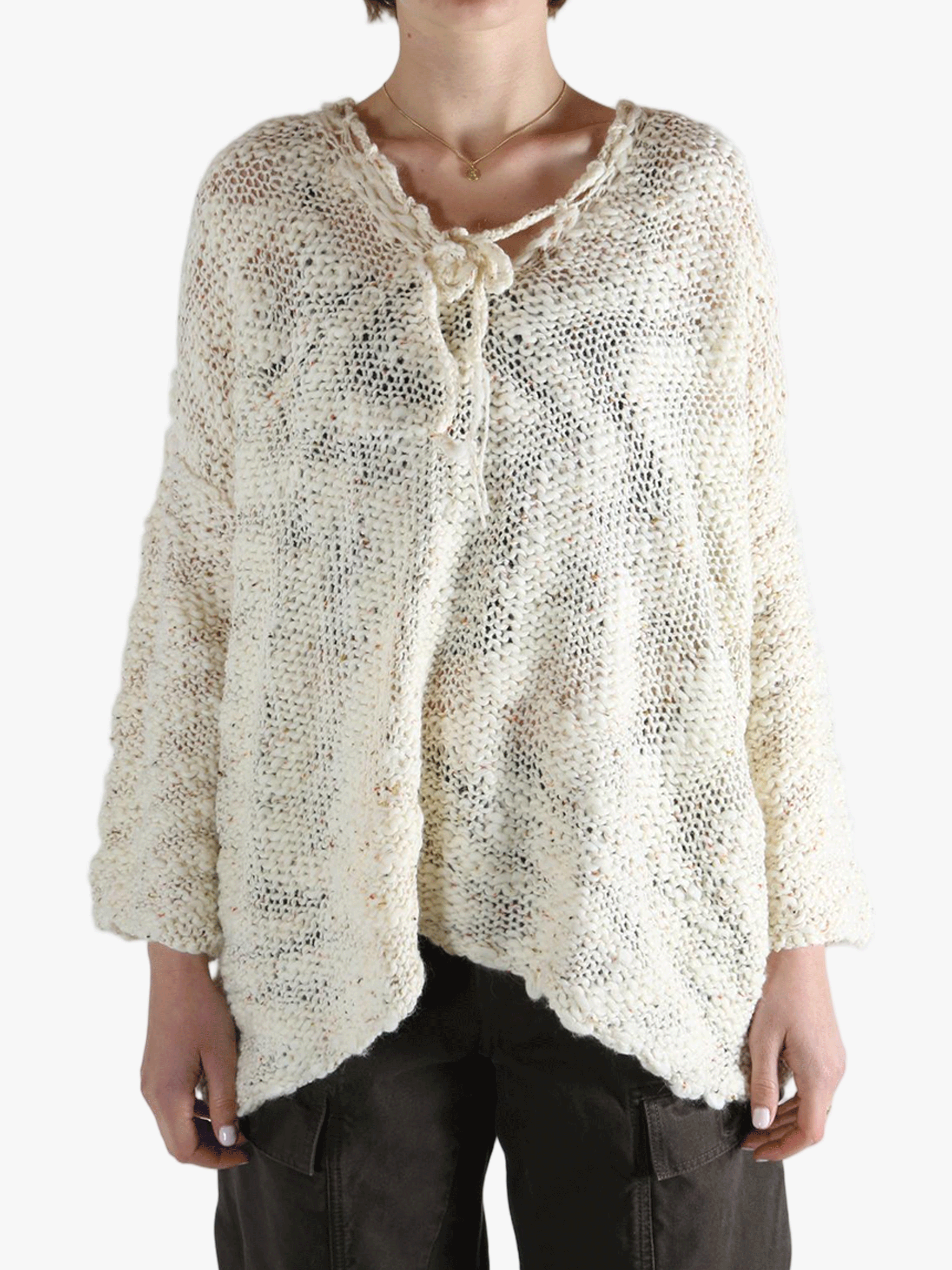 White tops worn by a person, showing the tops fit