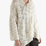 White tops worn by a person, showing the tops fit