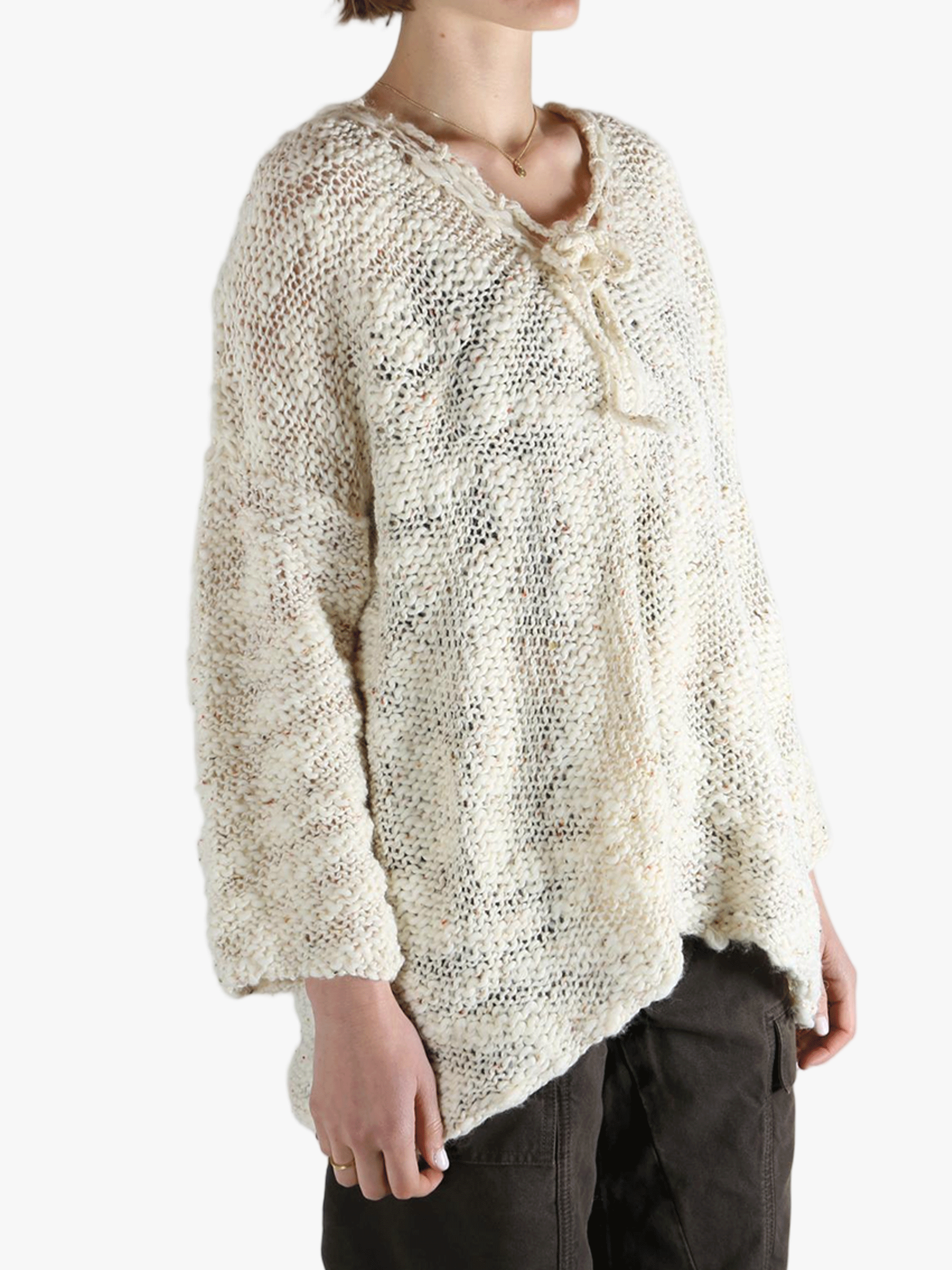 White tops worn by a person, showing the tops fit