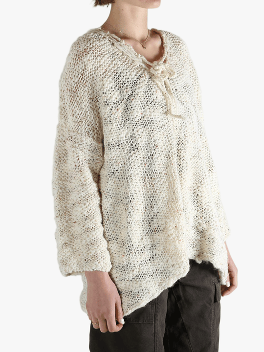 White tops worn by a person, showing the tops fit