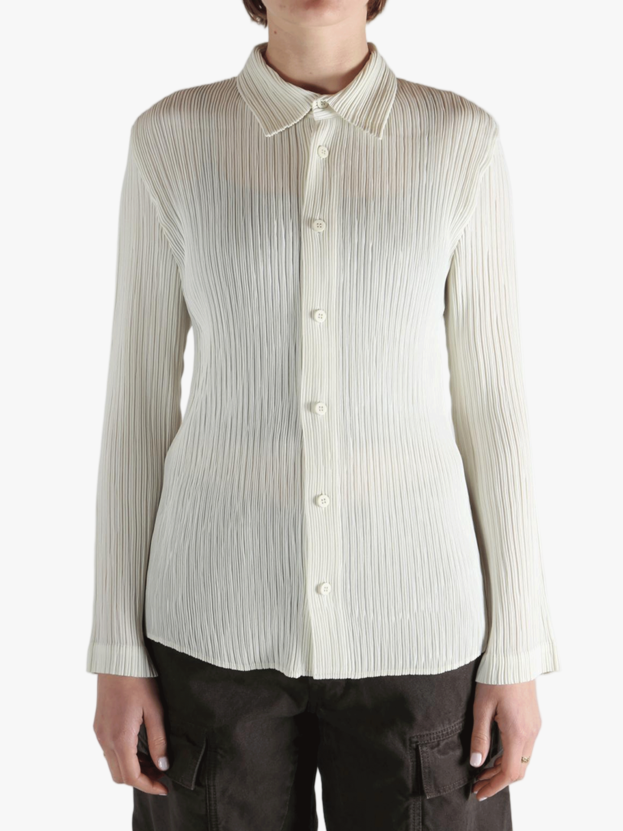 White shirt worn by a person, showing the shirt fit