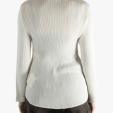 White shirt worn by a person, showing the shirt fit