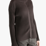 Brown jacket worn by a person, showing the jacket  fit