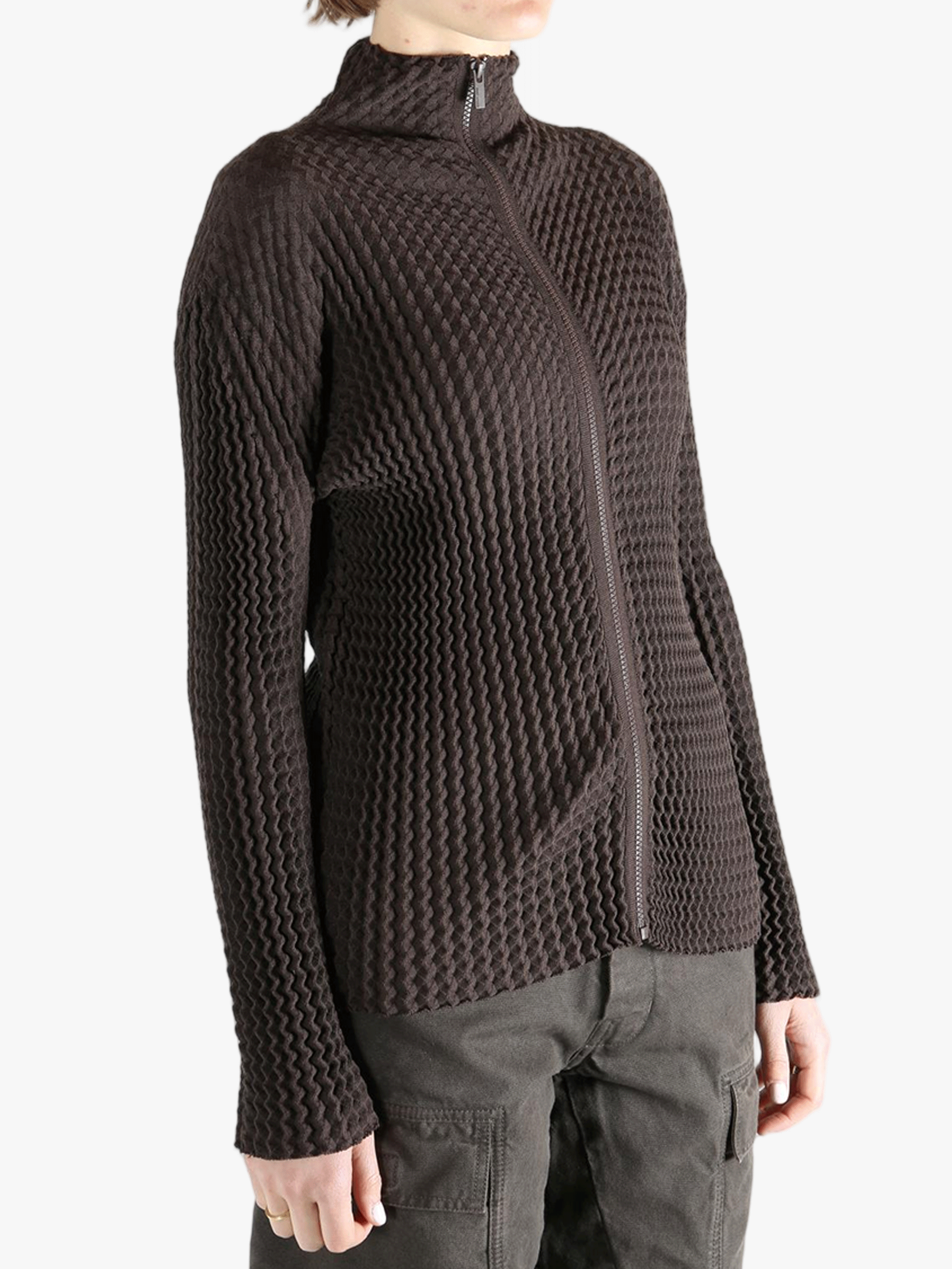 Brown jacket worn by a person, showing the jacket  fit