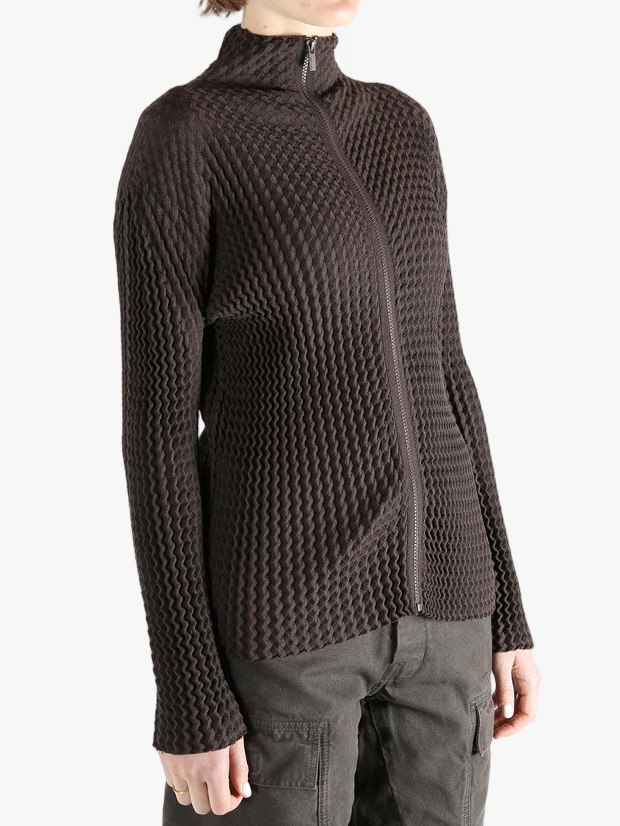 Brown jacket worn by a person, showing the jacket  fit