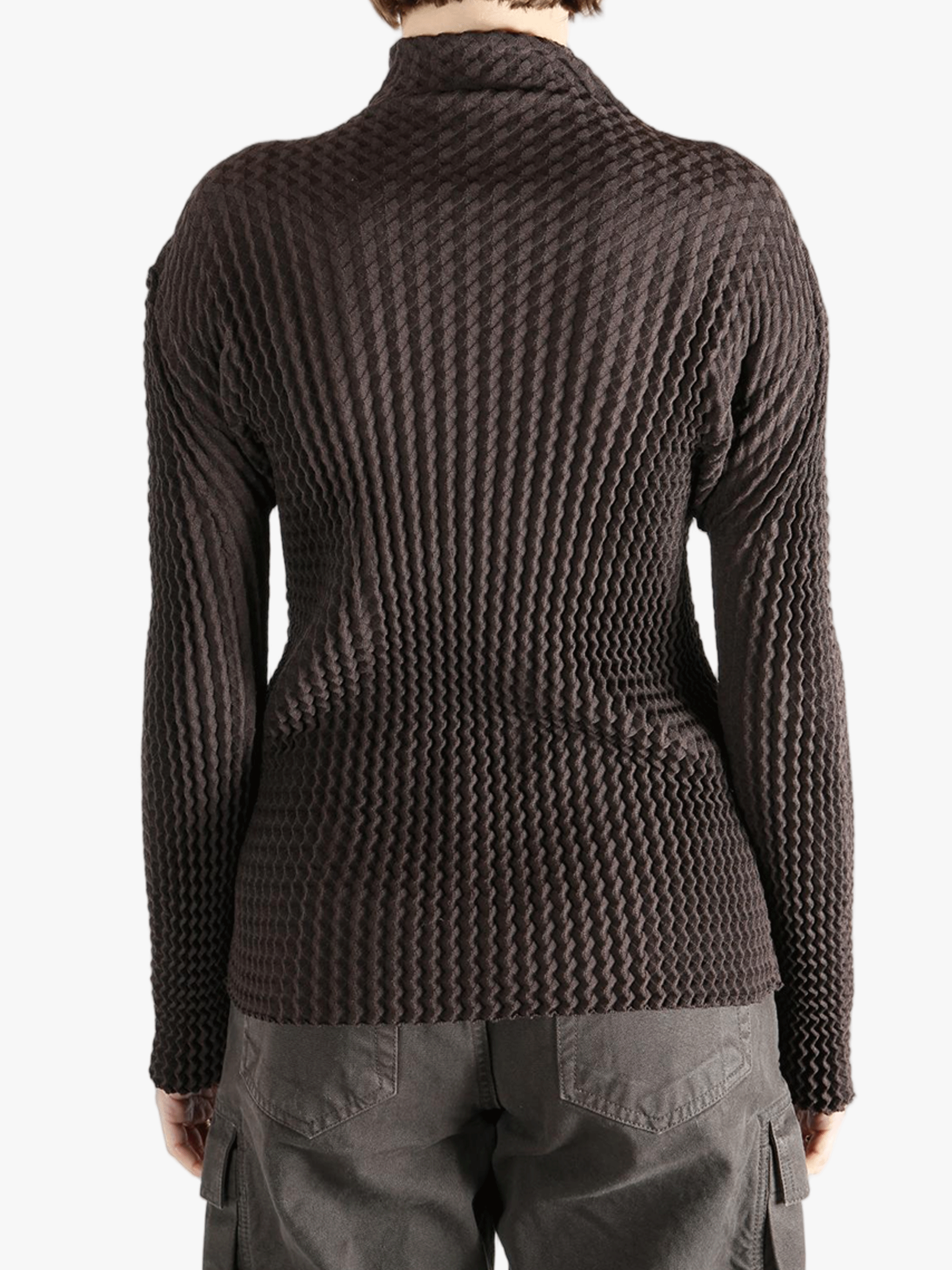 Brown jacket worn by a person, showing the jacket  fit