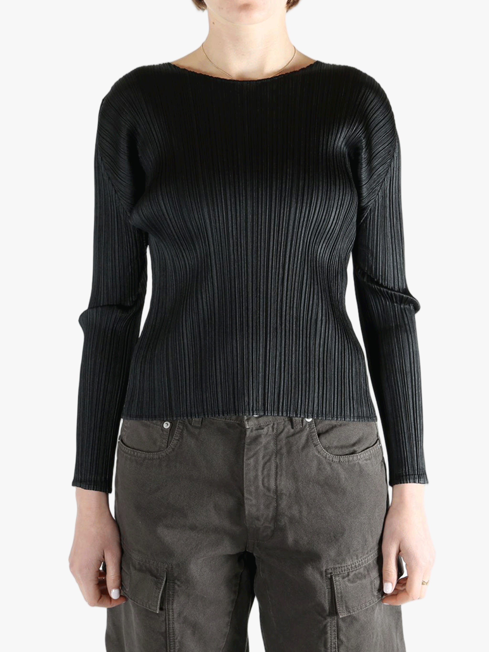 Black shirt worn by a person, showing the shirt fit