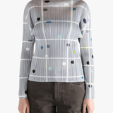 Grey shirt worn by a person, showing the shirt fit