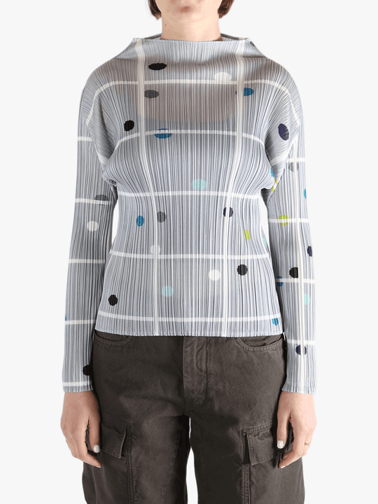 Grey shirt worn by a person, showing the shirt fit