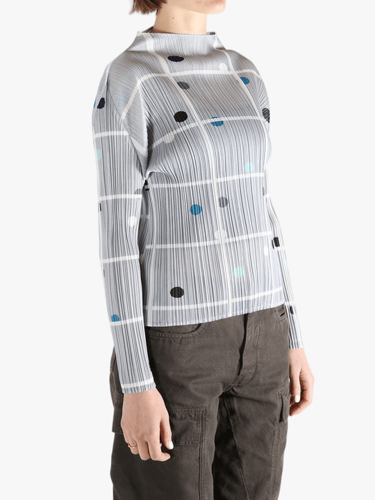 Grey shirt worn by a person, showing the shirt fit