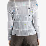 Grey shirt worn by a person, showing the shirt fit