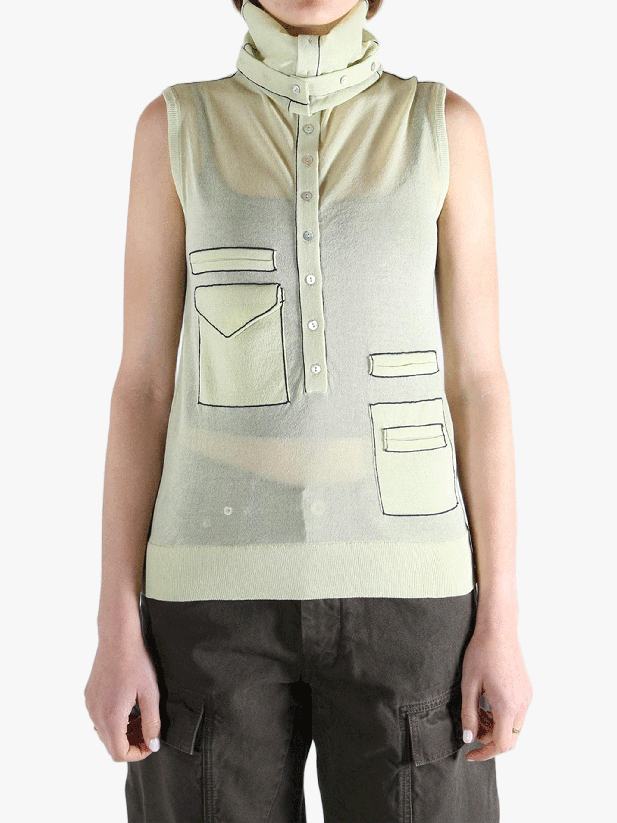 Green tops worn by a person, showing the tops fit