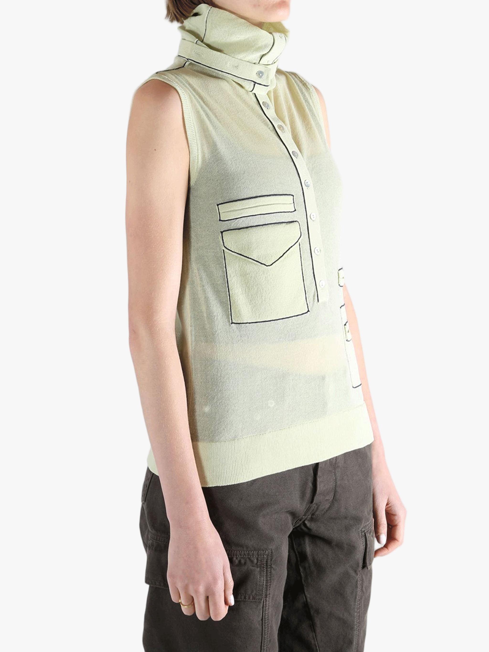 Green tops worn by a person, showing the tops fit