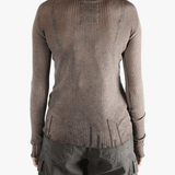 Brown tops  worn by a person, showing the tops fit