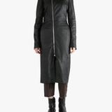 Black coat worn by a person, showing the coat fit