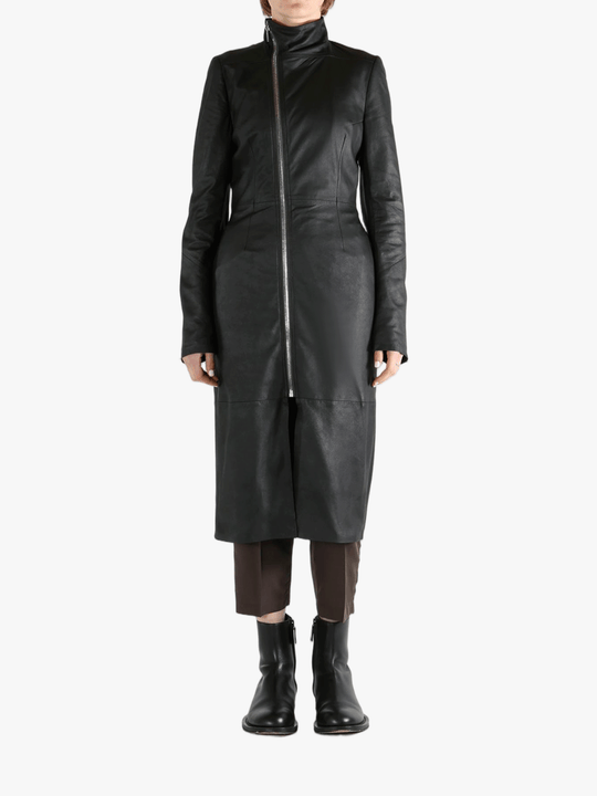 Black coat worn by a person, showing the coat fit