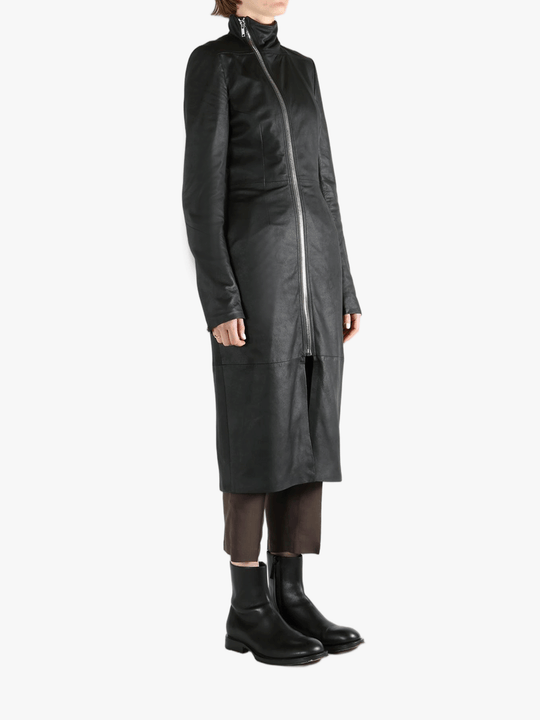 Black coat worn by a person, showing the coat fit