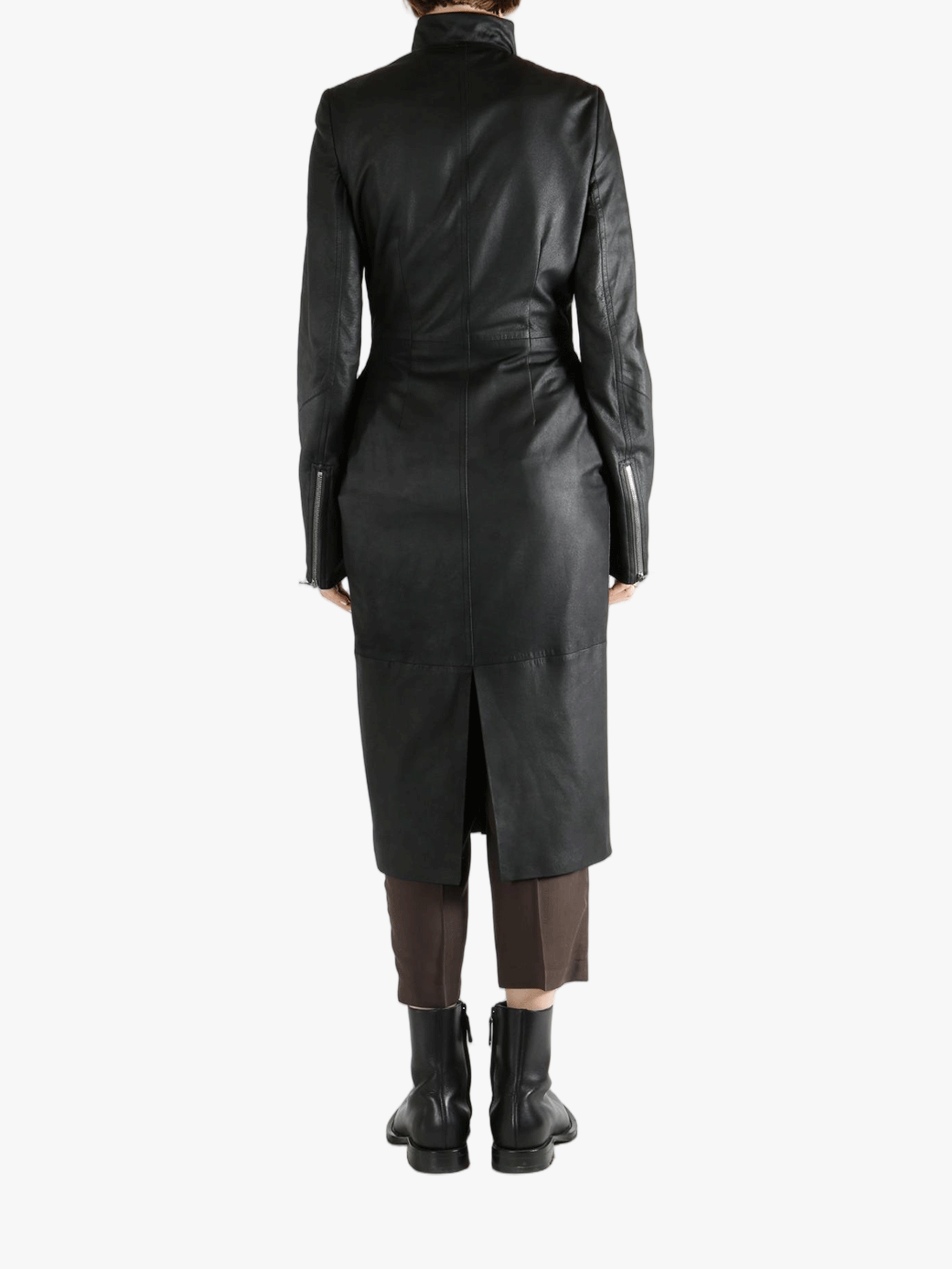 Black coat worn by a person, showing the coat fit