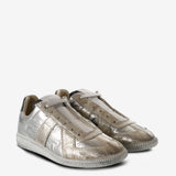 Silver sneakers, side view