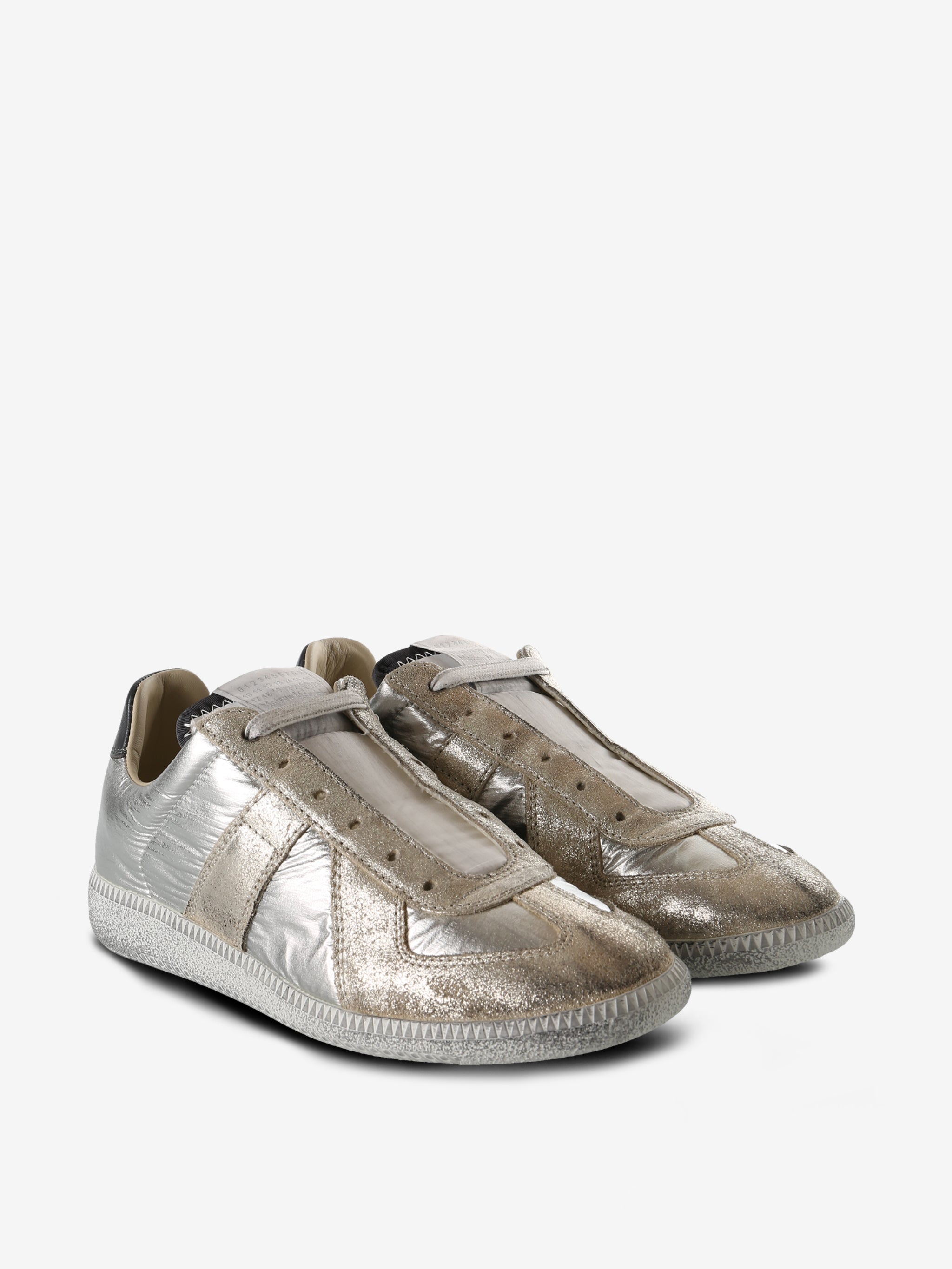 Silver sneakers, side view