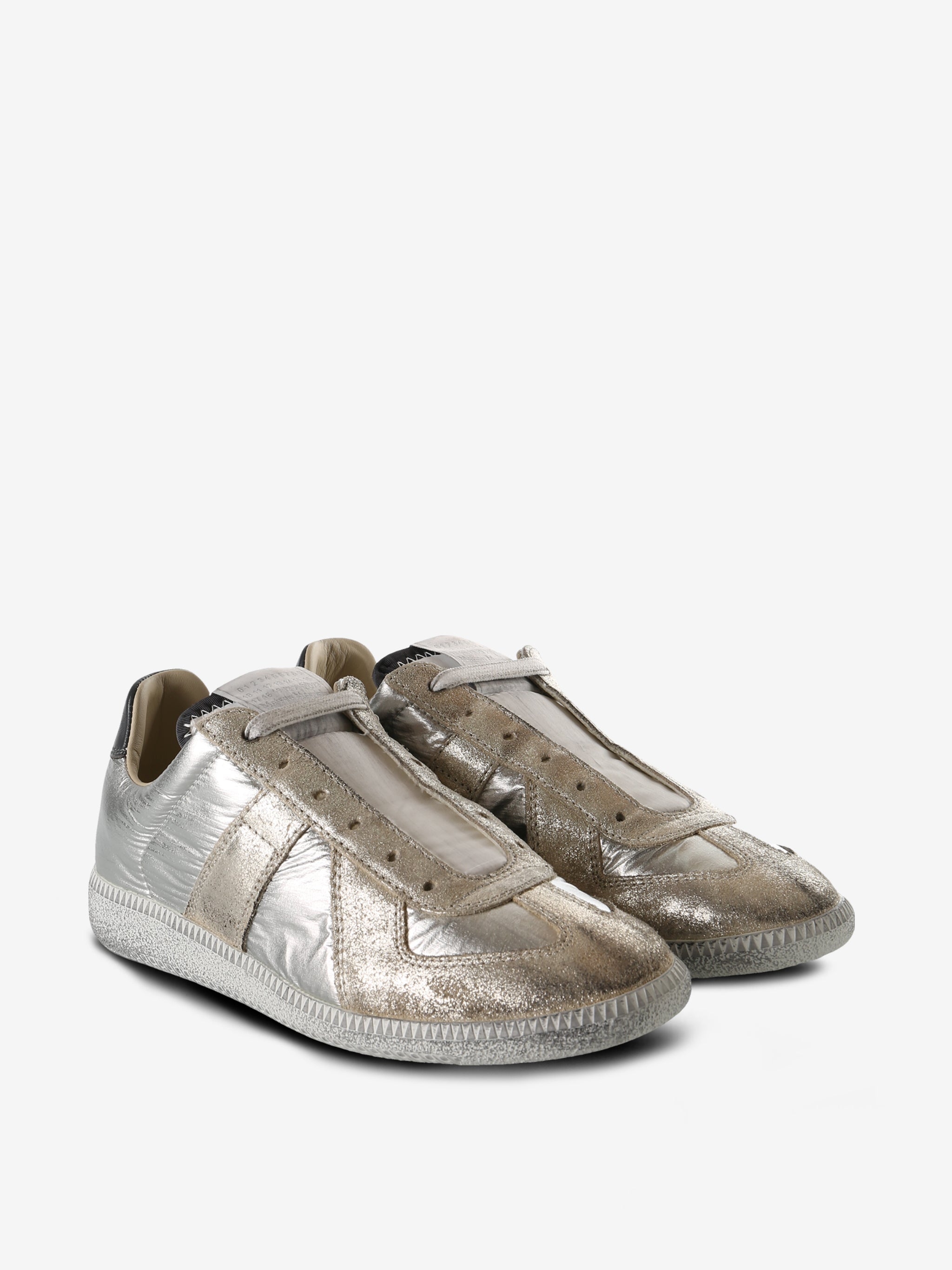 Silver sneakers, side view