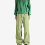 Green shirt, full body view