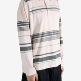 Pink shirt worn by a person, showing the shirt fit