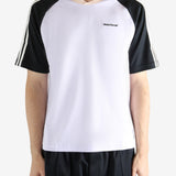 White t-shirt worn by a person, showing the t-shirt fit