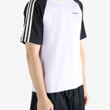 White t-shirt worn by a person, showing the t-shirt fit