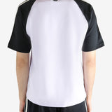 White t-shirt worn by a person, showing the t-shirt fit